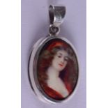 A SILVER PORTRAIT PENDANT.