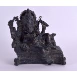 A SOUTH EAST ASIAN BRONZE FIGURE OF GANESHA modelled upon a rectangular base. 11 cm x 12 cm.