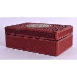 A 19TH CENTURY CHINESE CARVED CINNABAR LACQUER BOX AND COVER inset with a jade foliate roundel. 15