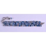 A SILVER BLUE TOPAZ AND AQUAMARINE BRACELET. 16 cm long.