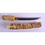 A GOOD 19TH CENTURY JAPANESE MEIJI PERIOD CARVED IVORY DAGGER within a lovely case decorated with