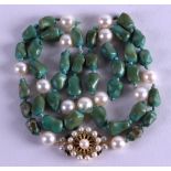 AN EARLY 20TH CENTURY 9CT GOLD TURQUOISE AND PEARL NECKLACE. 62 cm long.