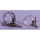 A PAIR OF AUSTRALIAN SILVER PLATED KANGAROO NAPKIN RINGS. 9.5 cm x 6 cm. (2)