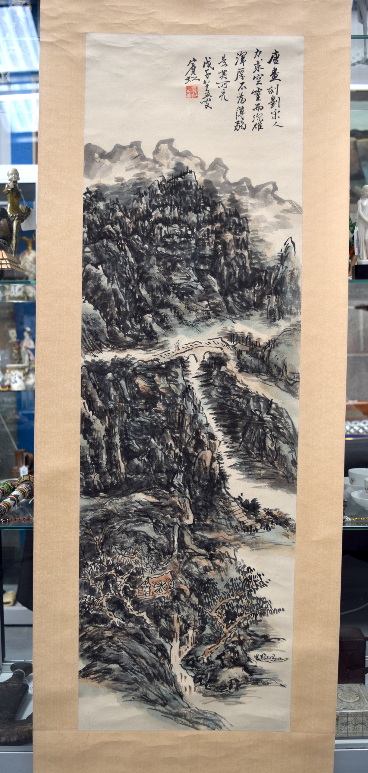 A CHINESE INKWORK SCROLL LANDSCAPE WATERCOLOUR 20th Century, painted with figures upon a bridge.