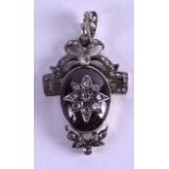 AN ANTIQUE WHITE METAL DIAMOND AND GARNET PENDANT. 2 cm x 3.25 cm.