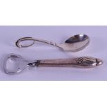 A STERLING SILVER GEORGE JENSEN SILVER BOTTLE OPENER together with a Jensen spoon. 2.5 oz. (2)