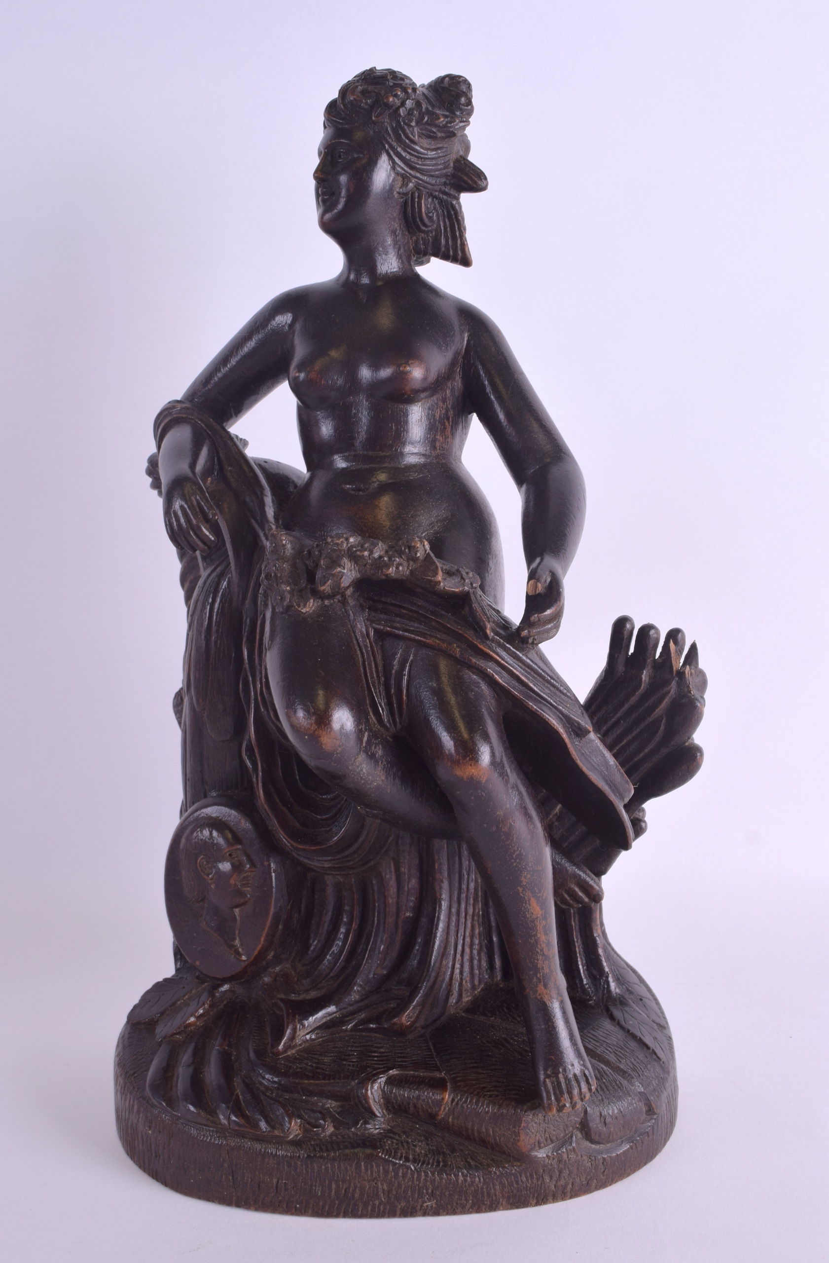 A LARGE 18TH/19TH CENTURY CONTINENTAL CARVED WOOD FIGURE OF A FEMALE possibly a representation of