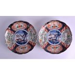 A PAIR OF 19TH CENTURY JAPANESE MEIJI PERIOD IMARI SCALLOPED DISHES painted with floral sprays and