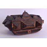 A LARGE AMERICAN CARVED TRAMP ART CASKET. 26 cm x 20 cm.