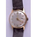 AN VINTAGE JUNGHANS WRISTWATCH with silvered dial. 3.25 cm diameter.