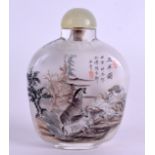 A GOOD CHINESE REVERSE PAINTED SNUFF BOTTLE painted with mountain goat and calligraphy. 9 cm high.