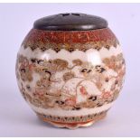 A 19TH CENTURY JAPANESE MEIJI PERIOD SATSUMA CENSER AND COVER painted with flowers. 6 cm x 6.5 cm.
