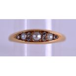 AN 18CT GOLD DIAMOND AND SEED PEARL RING. Size O. 4.6 grams.