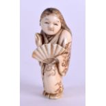 A 19TH CENTURY JAPANESE MEIJI PERIOD CARVED IVORY NETSUKE engraved with foliage. 5 cm high.