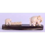 A LATE 19TH CENTURY CARVED IVORY AND HORN ELEPHANT. 11.5 cm wide.