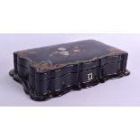 AN EARLY VICTORIAN BLACK PAPIER MACHE GAMING BOX painted with floral sprays. 23 cm x 12 cm.