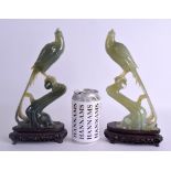 A LARGE PAIR OF 19TH CENTURY CHINESE CARVED JADE FIGURES OF BIRDS modelled upon naturalistic