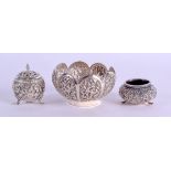 A 19TH CENTURY INDIAN SILVER BOWL together with two silver condiments. 5.5 oz. (3)