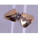A 14CT GOLD AND DIAMOND RING approx. 0.25 ct. 3.5 grams. Size M.