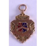 A 9CT GOLD AND ENAMEL MEDAL. 16.6 grams.