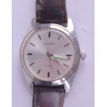 A VINTAGE CITIZEN WRISTWATCH. 3 cm diameter.