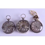 THREE 19TH CENTURY SILVER POCKET WATCHES with engraved silver faces. Largest 5 cm diameter. (3)