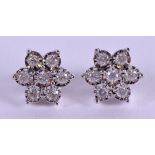 A PAIR OF 9CT GOLD 1CT DAISY CLUSTER EARRINGS.