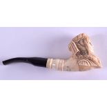 A NOVELTY CARVED BONE PIPE. 15 cm long.