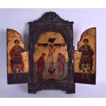 A 19TH CENTURY RUSSIAN PAINTED WOODEN FOLDING TRIPTYCH ICON decorated with saints. 42 cm x 38 cm.