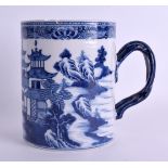 A LARGE 18TH CENTURY CHINESE EXPORT BLUE AND WHITE MUG Qianlong, painted with landscapes. 15 cm