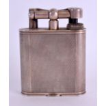 A RARE LARGE DUNHILL SILVER PLATED LIGHTER with engine turned body. 10 cm x 7.5 cm.