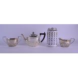 AN UNUSUAL S A MACQUEEN & CO SILVER BACHELORS TEASET comprising of teapot, sugar basin & milk jug.