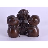 A GROUP OF THREE LITTLE PIGS modelled in a jovial manner. 7 cm x 5 cm.