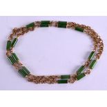A FINE 18CT YELLOW GOLD AND SPINACH JADE NECKLACE. 62 grams. 80 cm long overall.