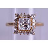 A 9CT GOLD AND CZ RING. 2.2 grams. Size K.