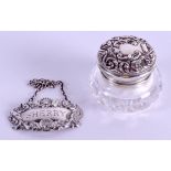 A SILVER SHERRY DECANTER LABEL together with a small silver pot and cover. (2)