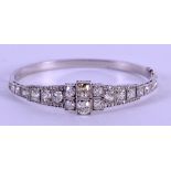 A STUNNING ART DECO PLATINUM AND DIAMOND BANGLE comprising of approximately 9ct of diamonds. 25.1