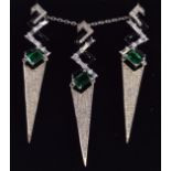 A SILVER GREEN STONE BLACK ENAMEL AND EMERALD NECKLACE with matching earrings. (3)