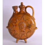 A LARGE 19TH CENTURY CONTINENTAL YELLOW GLAZED POTTERY EWER decorated with a Roman mask head