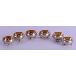 A SET OF SIX LATE 19TH CENTURY RUSSIAN SILVER SALTS. 5.3 oz. 3 cm diameter.