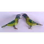 A PAIR OF EARLY 20TH CENTURY SILVER AND ENAMEL BIRDS modelled as birds of paradise. 9 cm x 5 cm.