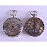 TWO 19TH CENTURY SILVER POCKET WATCHES with engraved silver faces. 5 cm diameter. (2)