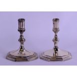 A PAIR OF 1920S SILVER CANDLESTICKS. London 1929. 8.2 oz. 8.5 cm high.