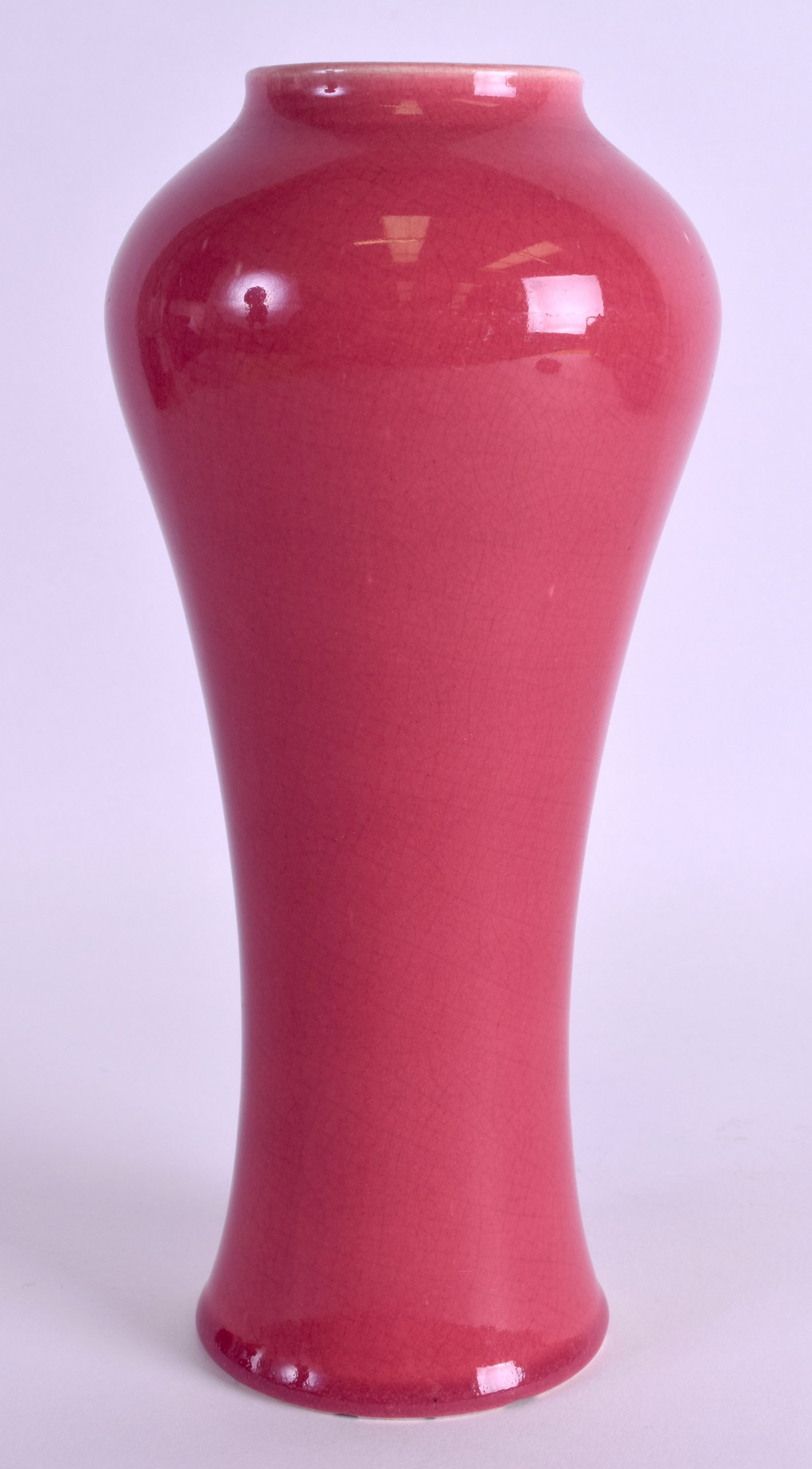 AN AULT POTTERY VASE of Chinese monochrome style, thickly potted with a rose pompadour glaze. 22