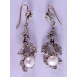 A PAIR OF 9CT GOLD SILVER AND PEARL EARRINGS.