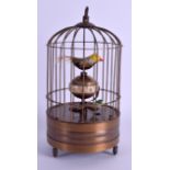 A BRASS BIRDCAGE WIND UP CLOCK. 20 cm high.