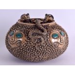 AN UNUSUAL ZODIAC POTTERY BOWL decorated with mask heads and dimpled motifs. 17 cm wide.