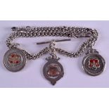 AN ANTIQUE SILVER CHAIN together with three Northampton silver football medals. (4)