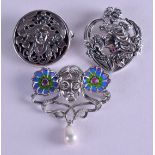 THREE SILVER BROOCHES one with enamel decoration. (3)