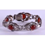 AN ART DECO SILVER AND GARNET BRACELET. 18 cm long.